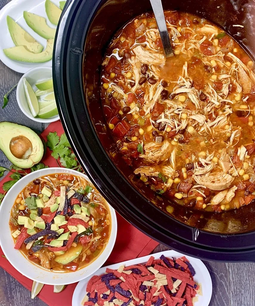 Crockpot chicken tortilla soup a delicious and easy homemade soup recipe!  Add it to your meal prep for the week; this recipe also scales easily for larger groups! Slow Cooker Chicken Tortilla Soup | Rotisserie Chicken Tortilla Soup Slow Cooker | Creamy Chicken Tortilla Soup Slow Cooker | Healthy Chicken Tortilla Soup Slow Cooker | Crockpot Tortilla Soup 