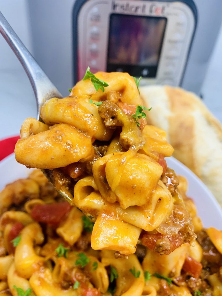 Our Instant Pot goulash recipe with beef takes a family favorite recipe and makes it easier to make while bringing out rich and delicious flavors. Goulash with Corn | Old Fashioned Goulash Recipe | Goulash Macaroni Recipe | Cheesy Instant Pot Goulash | Instant Pot Casserole Recipe | Instant Pot Macaroni Recipe 