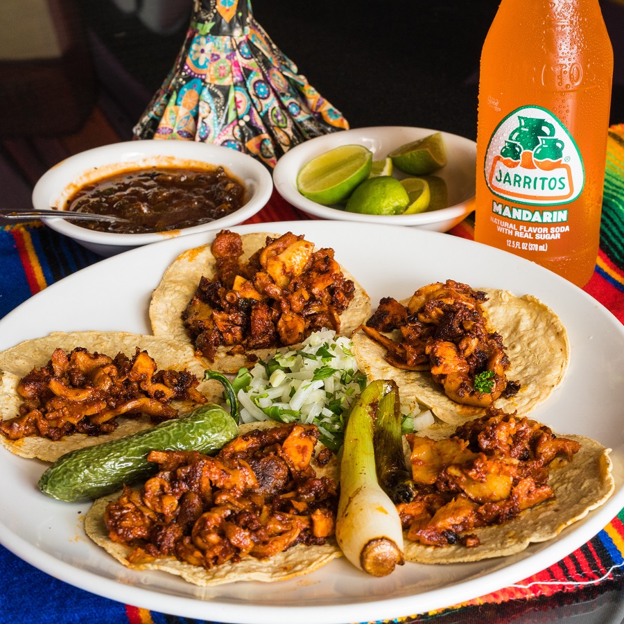 Crockpot Pantry Meals Plate of Tacos with Drink in the Background