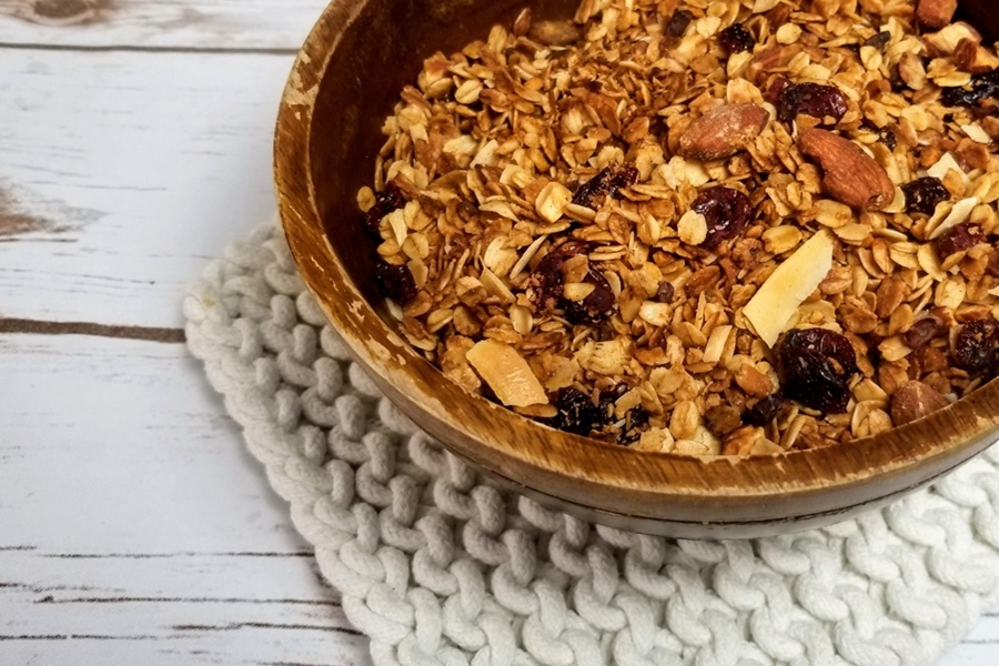 Crockpot Gluten Free Granola Recipe a Wooden Bowl of Granola on a Wooden Surface