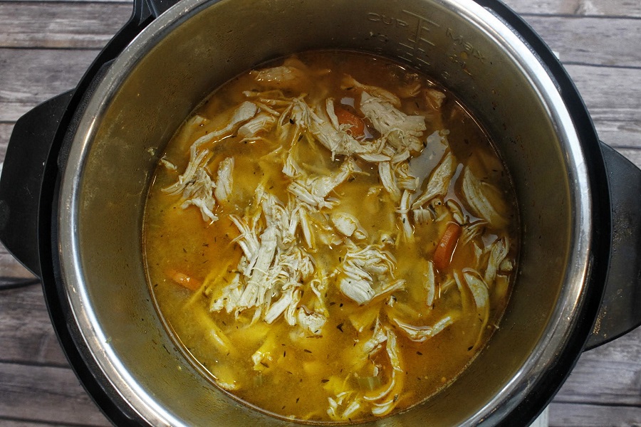 Healthy Instant Pot Chicken and Veggies Soup Cooking in an Instant Pot