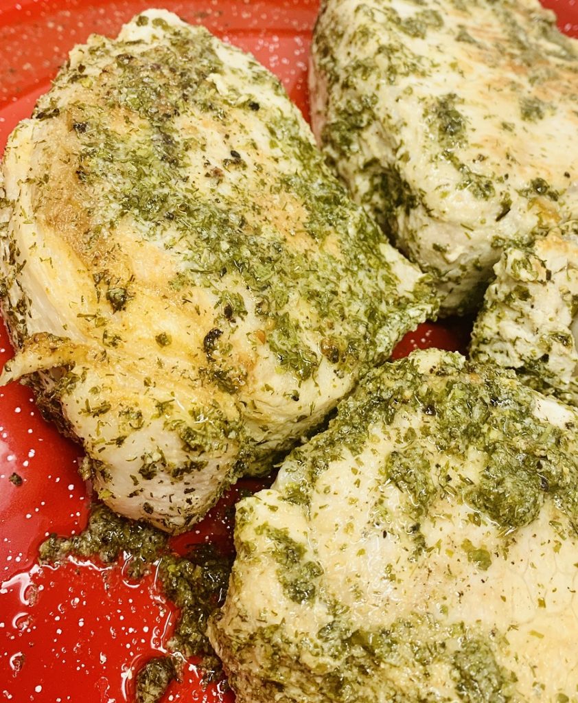 Low Carb Instant Pot Pork Chops Recipe Pork Chops Resting on a Red Plate
