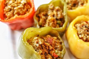 Low Carb Slow Cooker Stuffed Peppers Assorted Stuffed Peppers on a Plate