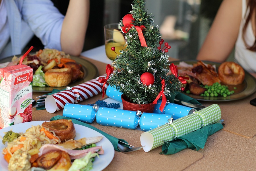 Instant Pot Holiday Side Dishes People Sitting at a Table with Holiday Centerpieces