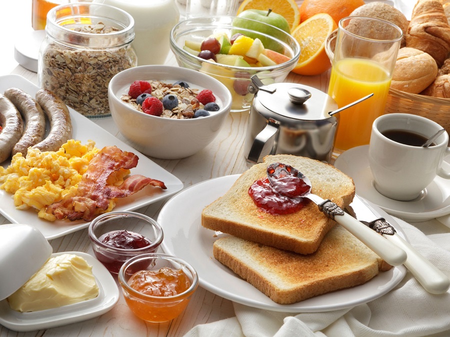 Crockpot Breakfast Ideas a Breakfast Spread with A Glass of Juice