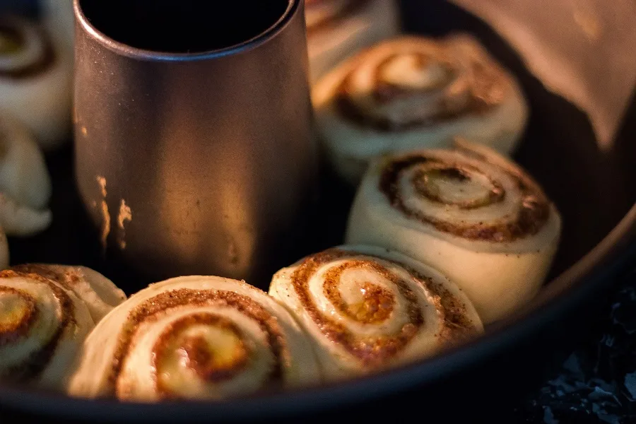 Crockpot Monkey Bread Recipes for Breakfast Cinnamon Roll Dough in a Baking Dish