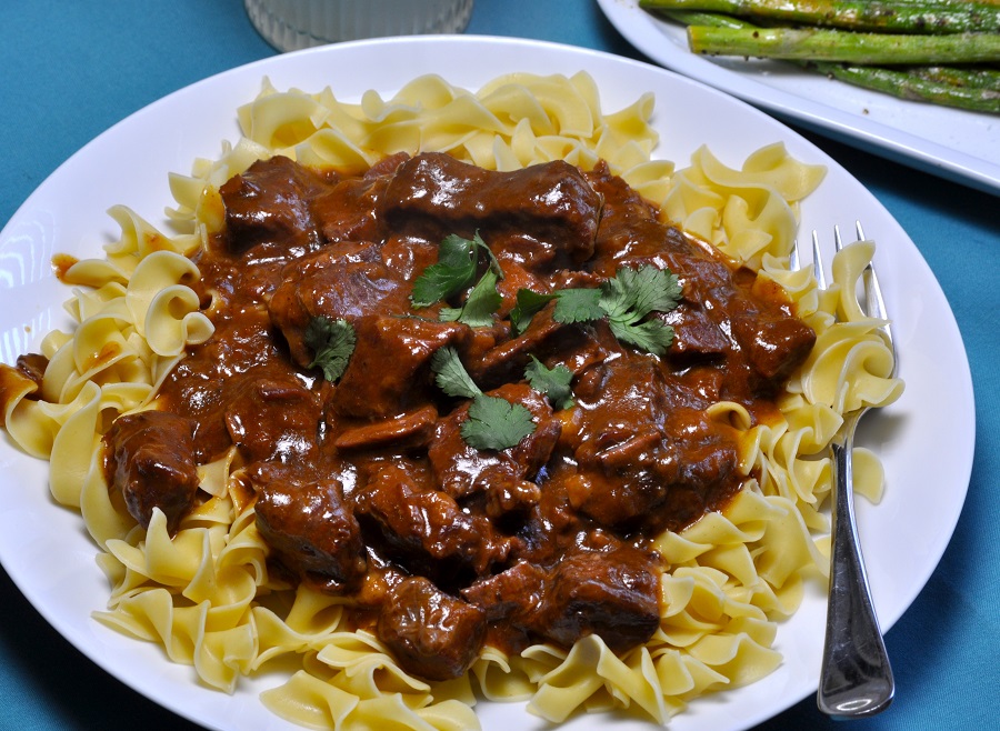 Budget Friendly Beef Stroganoff Overhead View of Beef Stroganoff with a Fork