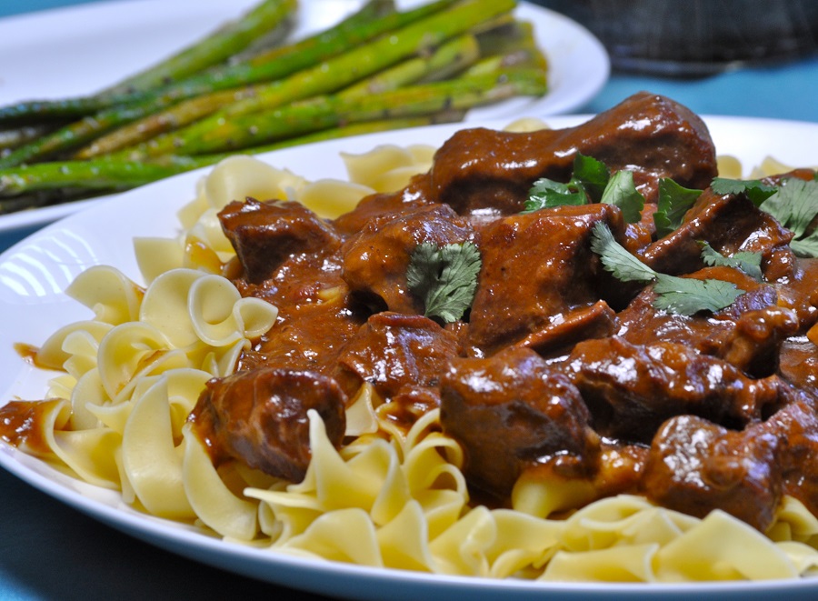 Budget Friendly Beef Stroganoff on Noodles on a Plate