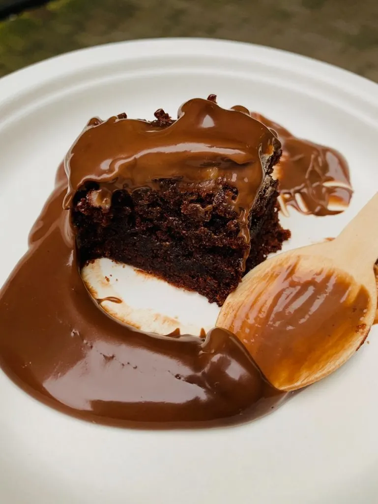 Instant Pot Desserts for a Crowd a Slice of Cake Covered in Caramel Sauce
