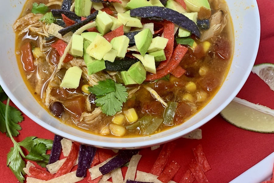 Slow Cooker Creamy Chicken Tortilla Soup Recipes Close up of a White Bowl Filled with Soup