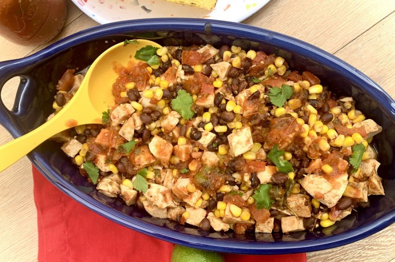 Slow Cooker Salsa Chicken for Tacos Overhead View of Chicken Cooking in a Crockpot