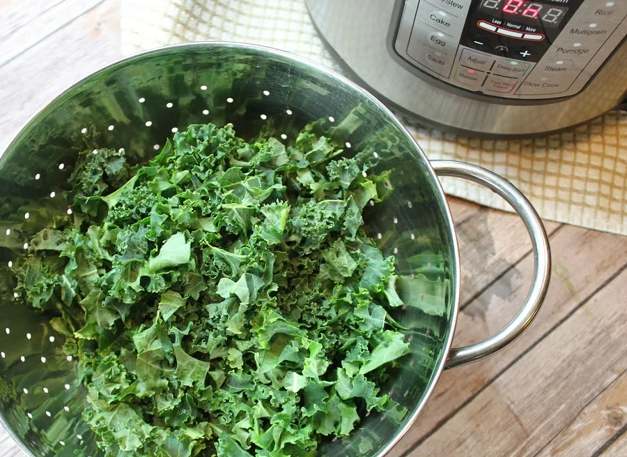 Instant Pot Kale Soup with Sausage Recipes Kale in a Collinder Next to an Instant Pot