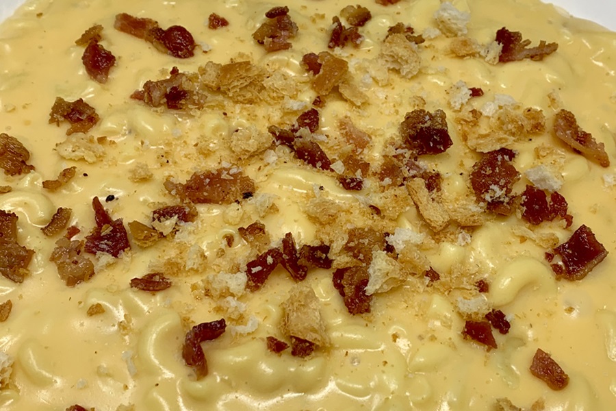 Crockpot Macaroni and Cheese Recipe Close Up of Macaroni and Cheese Topped with Bacon