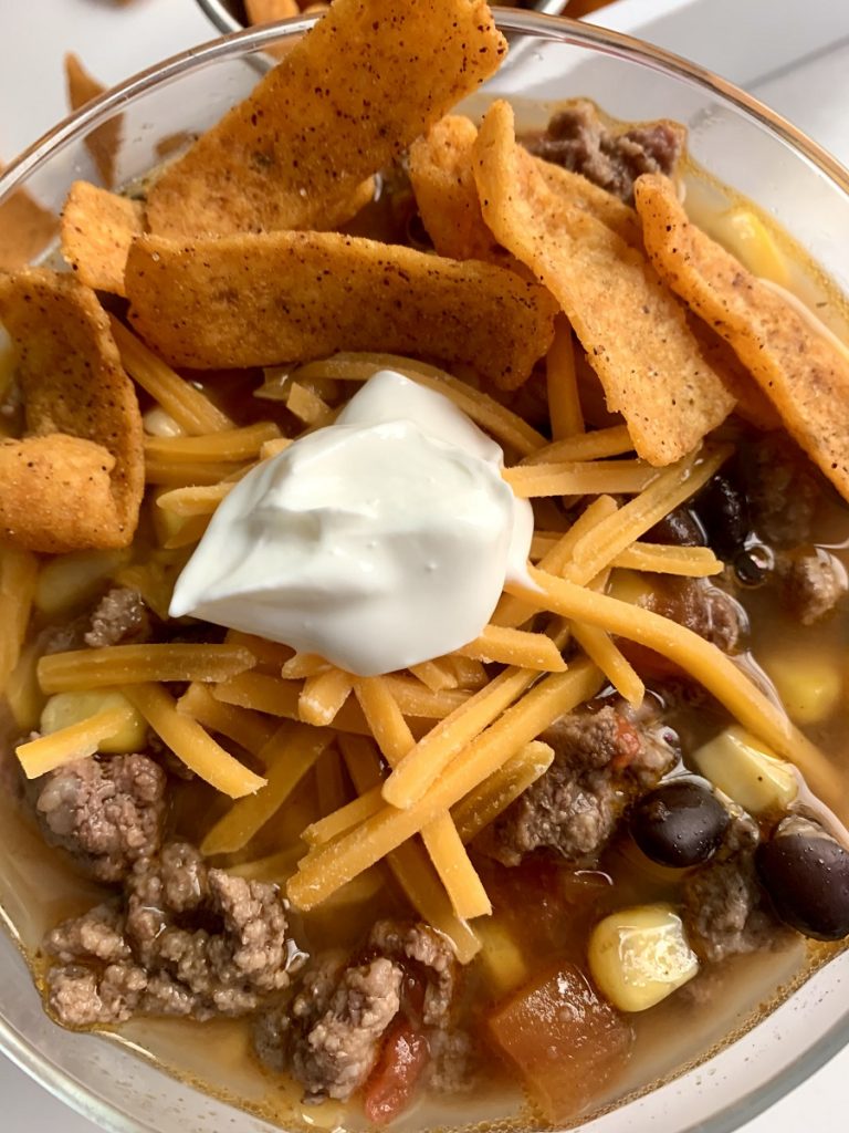Crockpot Taco Soup Recipe with Beans Close Up of a Bowl of Soup with Garnishes