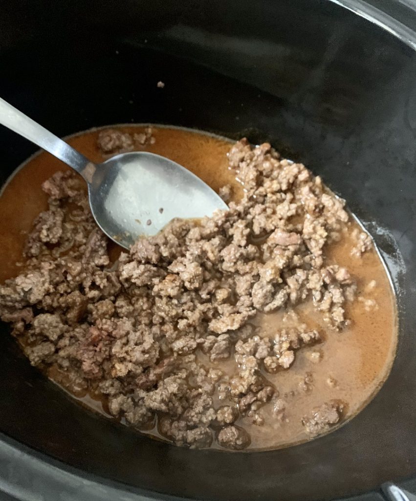 Crockpot Taco Soup Recipe with Beans Overhead View of Ground Beef in Crockpot
