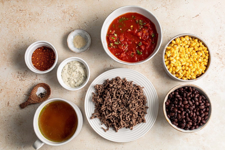 Crockpot Taco Soup Recipe Overhead View of Ingredients Separated into Small Dishes