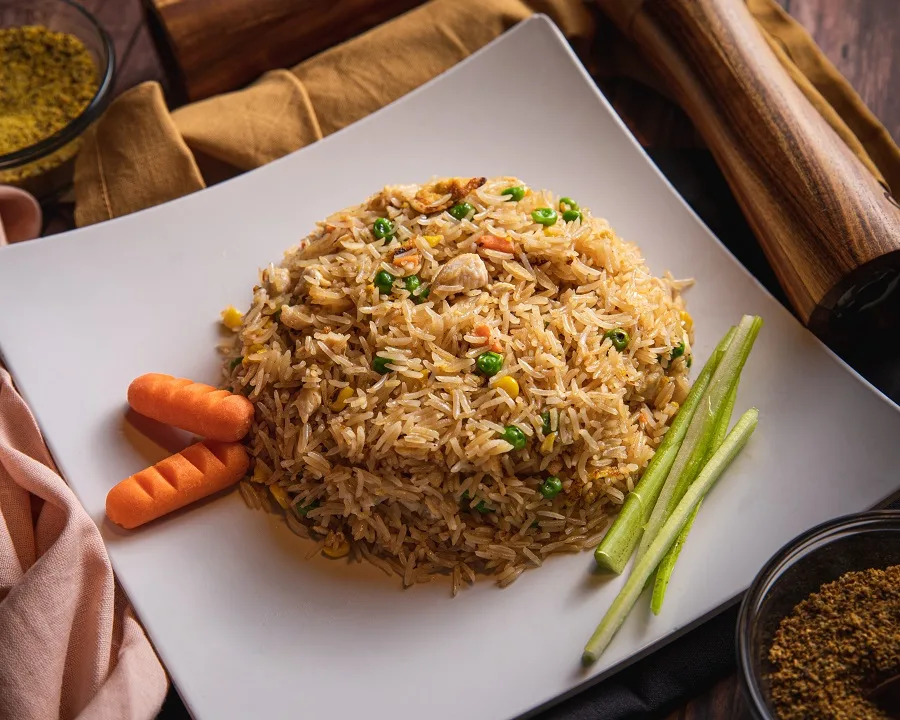 Instant Pot Tips for Cooking Rice a Plate of Fried Rice with Carrots and Green Onions