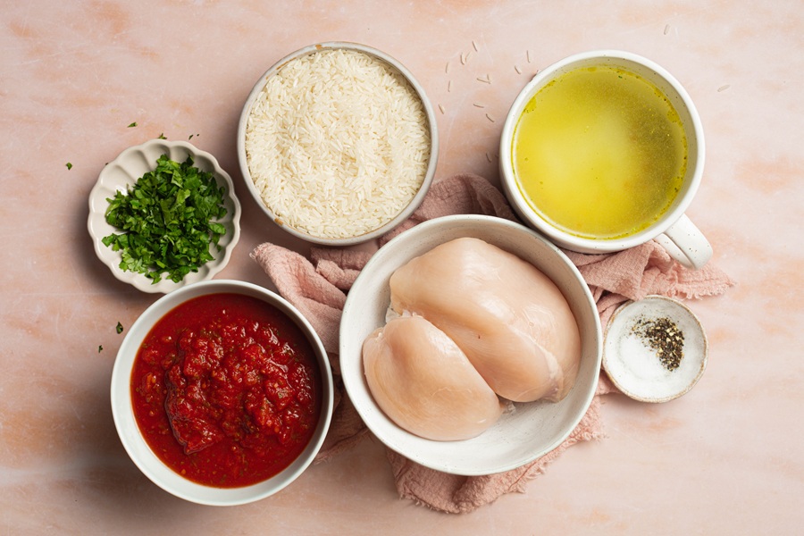 Ingredients for Salsa Chicken and Rice Crock Pot Recipe Separated on a Counter Top