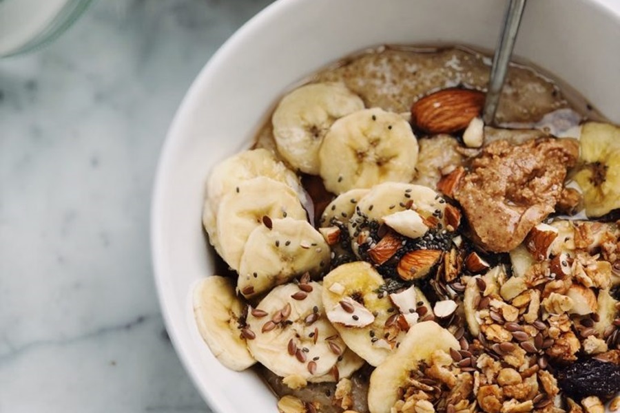 Easy Instant Pot Breakfast Recipes Close Up of a Bowl of Oatmeal with Bananas and Almonds