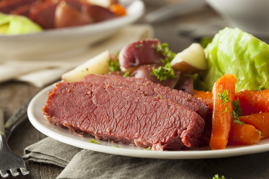 Crockpot Corned beef and Cabbage Recipes Close Up of a Plate with Sliced Corned Beef, Cabbage, and Carrots