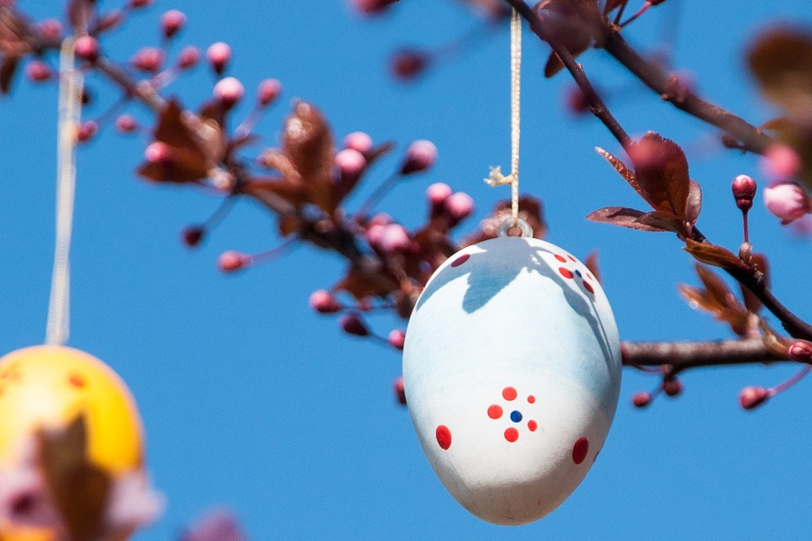 Crockpot Easter Recipes Close Up of an Easter Egg Hanging from a Tree