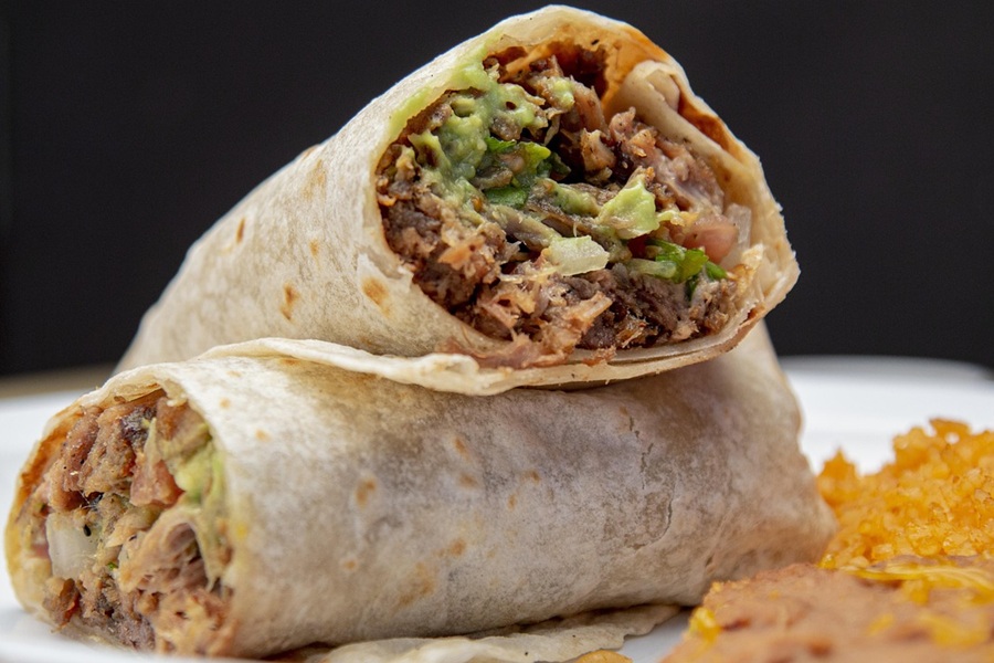 Instant Pot Cinco de Mayo Recipes Close Up of a Burrito Cut in Half