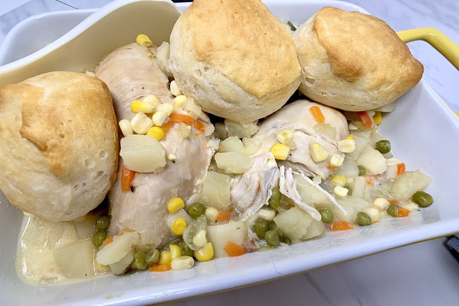 Chicken and Gravy Crockpot Recipes Close Up of Chicken and Gravy with Biscuits, Corn and Peas