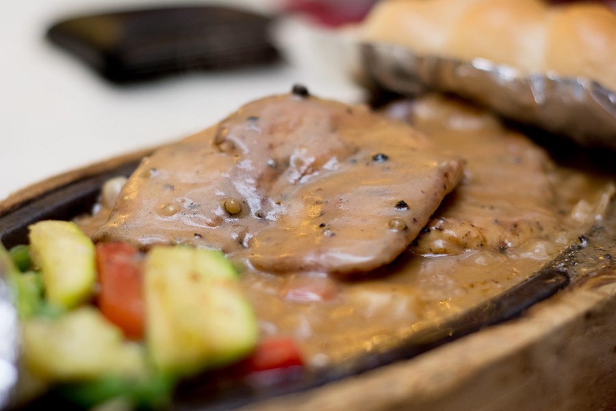 Instant Pot Chicken and Gravy Recipes Close Up of a Piece of Chicken Covered in Gravy