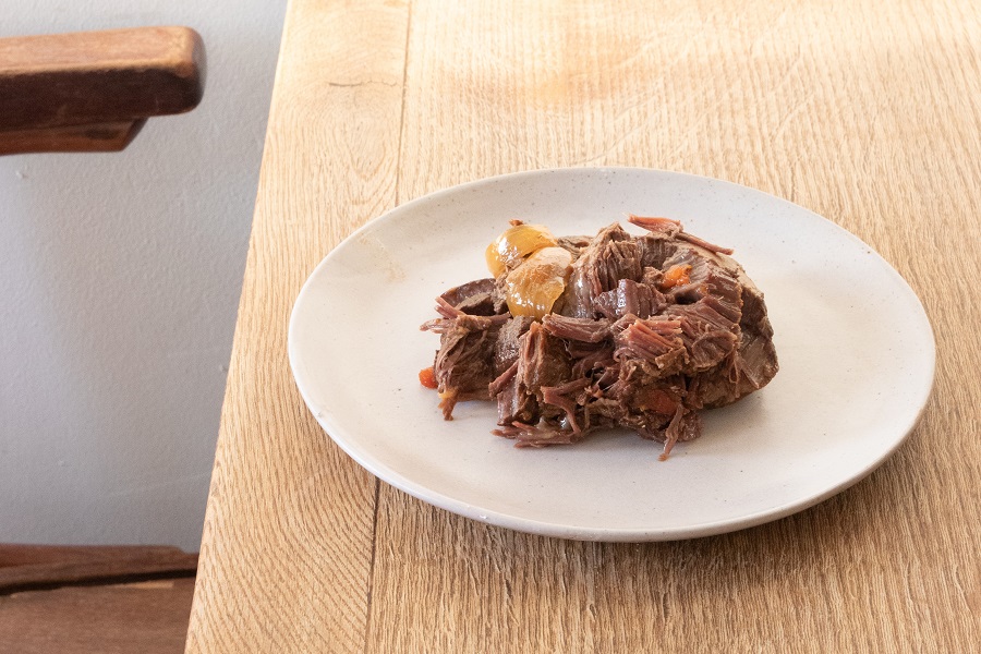 Slow Cooker Short Ribs Recipes Close Up of a Plate with Meat from Short Ribs