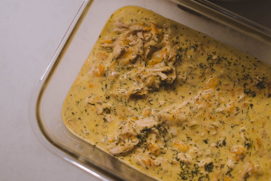 Instant Pot Chicken and Gravy Recipes Overhead View of a Serving Dish Filled with Chicken and Gravy