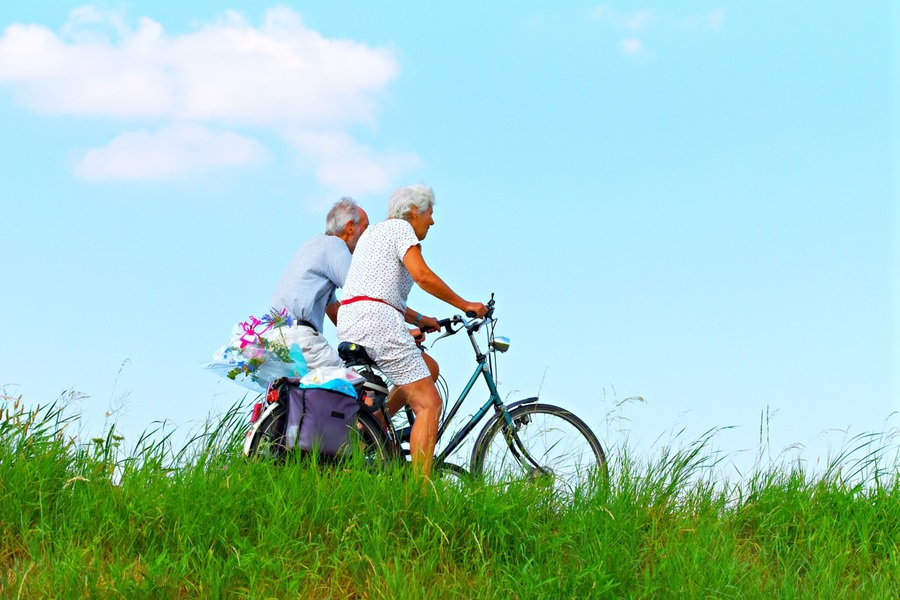 Easy Crockpot Summer Dinner Recipes an Elderly Couple Riding Bikes Together Through a Field