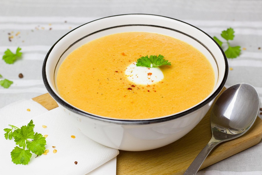 Instant Pot Blender Soup Recipes Close Up of a Bowl of Soup with a Spoon on the Side