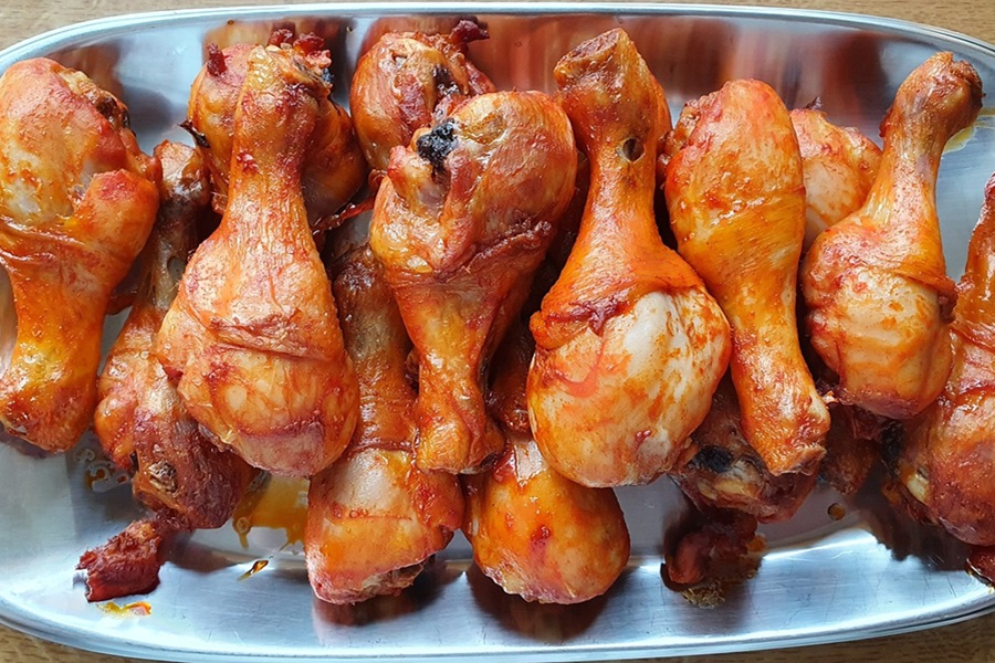 Best Slow Cooker Recipes with Chicken Overhead View of BBQ Chicken Drumsticks on a Serving Platter