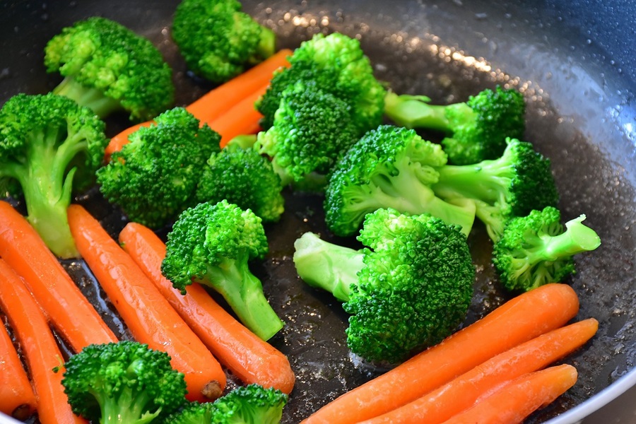 Healthy Crockpot Meals on a Budget Close Up of Broccoli and Carrots in a Pan