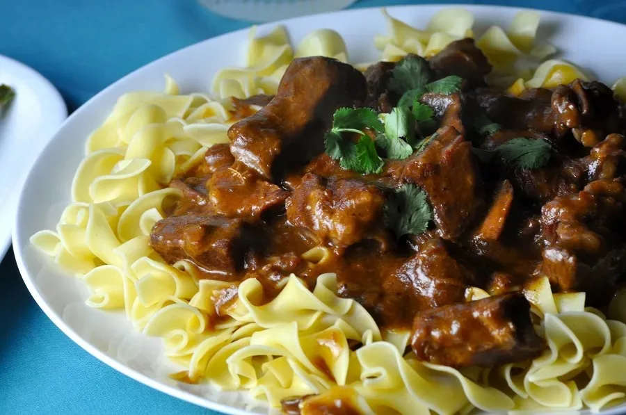 Healthy Crockpot Meals on a Budget Close Up of a Plate of Beef Stroganoff