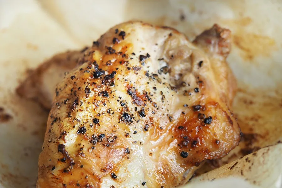 Slow Cooker Recipes with Chicken Close Up of a Piece of Cooked Chicken with Seasoning