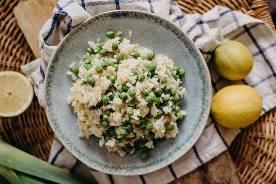 How to Make Instant Pot Rice Overhead View of a Plate of Rice with Peas