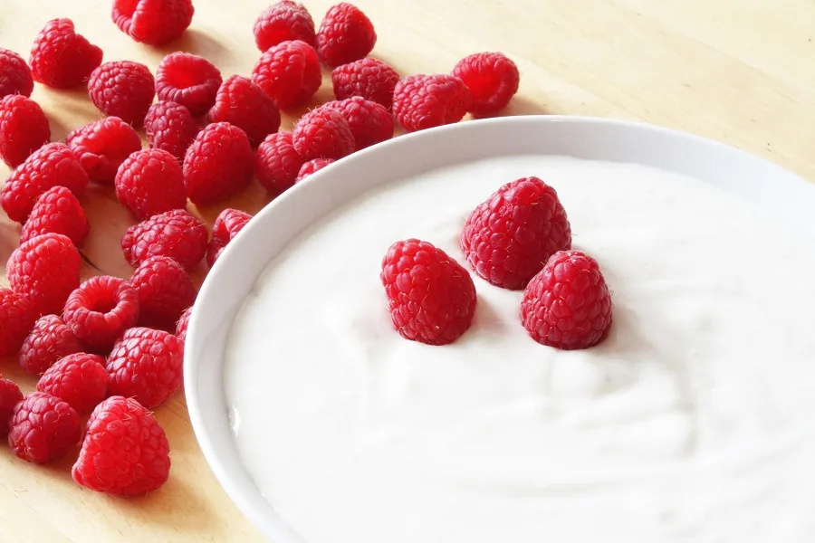 How to Make Instant Pot Yogurt a Simple Bowl of Yogurt with Three Raspberries 