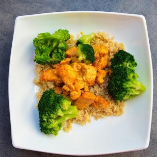 Slow Cooker Recipes with Chicken Overhead View of a Plate of Chicken and Rice with Broccoli