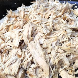 How to Make Instant Pot Shredded Chicken Close Up of a Plate of Shredded Chicken