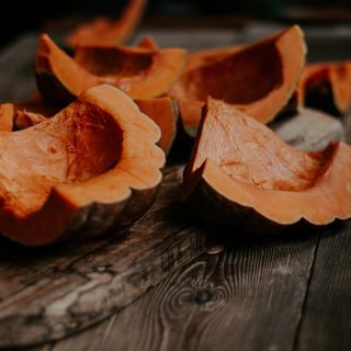 Crockpot Pumpkin Bread Recipes Close Up of a Pumpkin That Has Been Cut Into Fourths