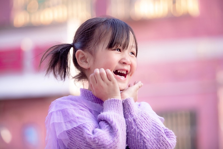 Kid Friendly Crock Pot Recipes Little Girl Smiling and Holding Her Chin in Her Hands