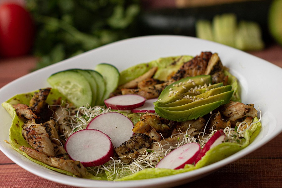Instant Pot Chicken Tacos in a Bowl with Radish Slices and Lime 
