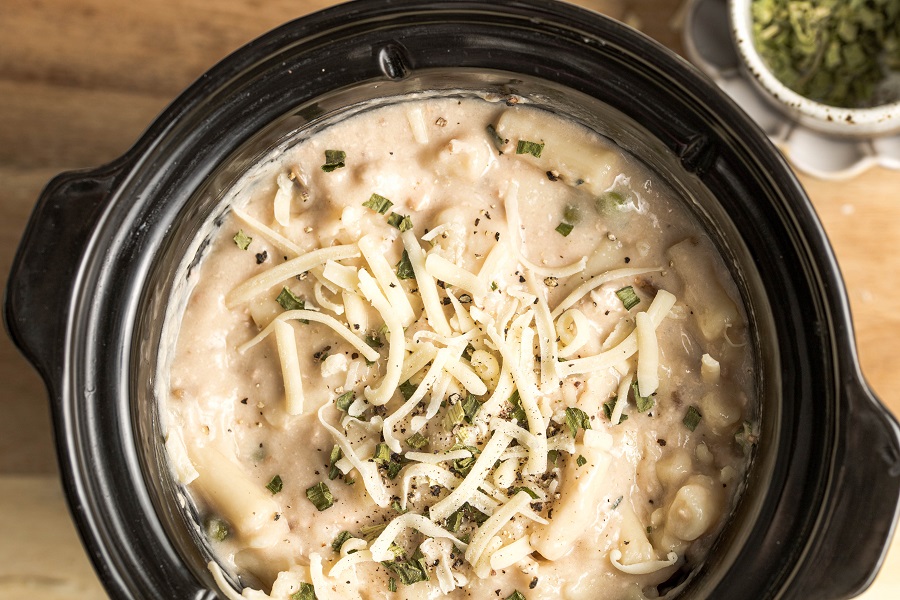 Crockpot Leftover Turkey Casserole Recipe Overhead View of a Crockpot with Casserole Topped with Cheese