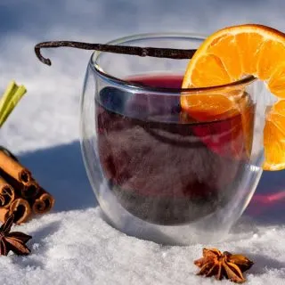 Crockpot Sangria Recipes a Glass of Sangria Sitting Outside on Snow with an Orange Slice on the Rim