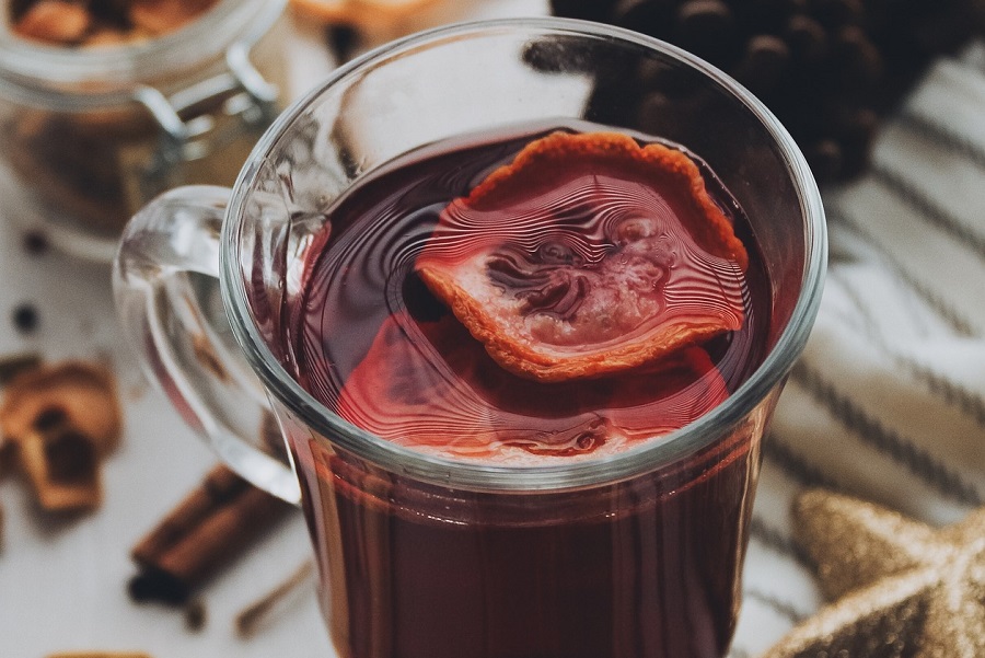 Crockpot Sangria Recipes Close Up of a Glass of Sangria with Dried Fruit On Top