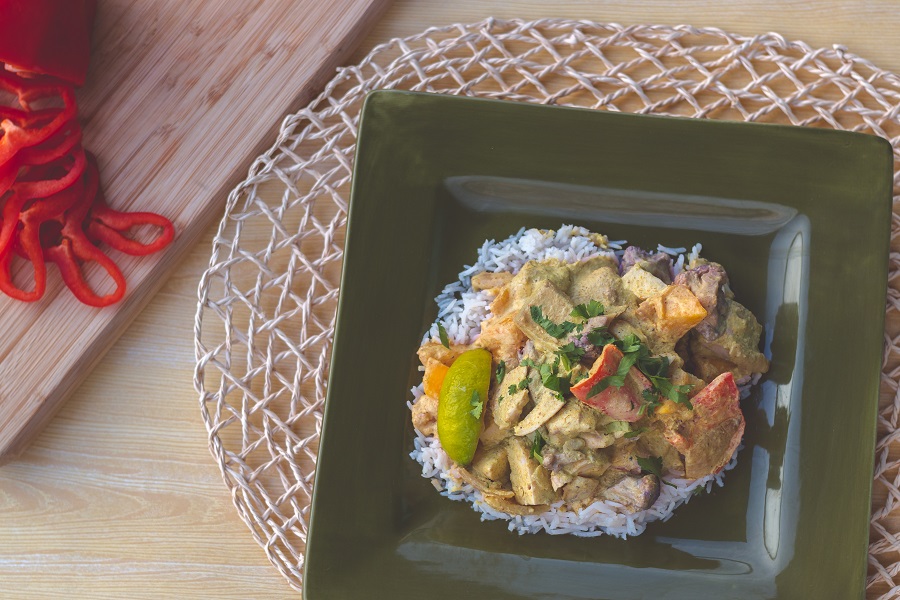  Instant Pot Chicken and Rice Recipes Overhead View of a Plate of Chicken and Rice with Veggies