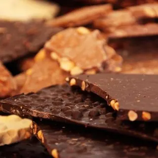 Crockpot Candy Recipes with Almond Bark Close Up of Sheets of Chocolate with Nuts