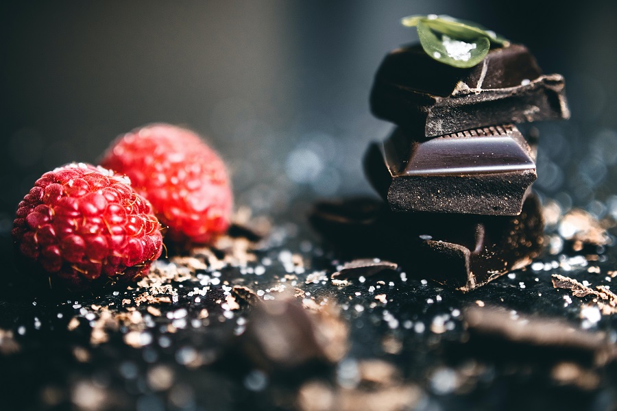 Crockpot Candy Recipes Chocolate with Raspberries Sitting Next to It