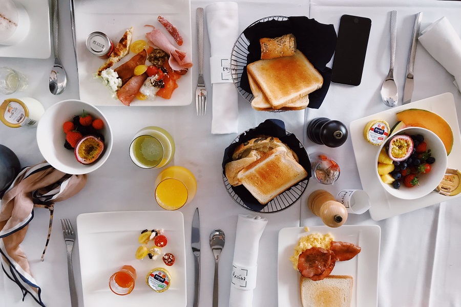 Slow Cooker Brunch Recipes Overhead View of a Table with Assorted Brunch Dishes